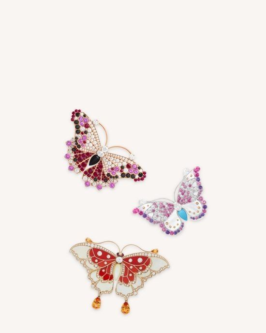 Cybèle butterfly clip, rose gold, pink sapphires, rubies, black spinels, onyx, diamonds, Hespérie butterfly clip, white gold, pink and mauve sapphires, turquoise, white mother-of-pearl, diamonds, Gold Papillon Nacre clip, rose gold, round diamonds, gold mother-of-pearl, red coral, pear-shaped spessartite garnets and pink cabouchon-cut tourmalines. Butterflies collection, Van Cleef & Arpels