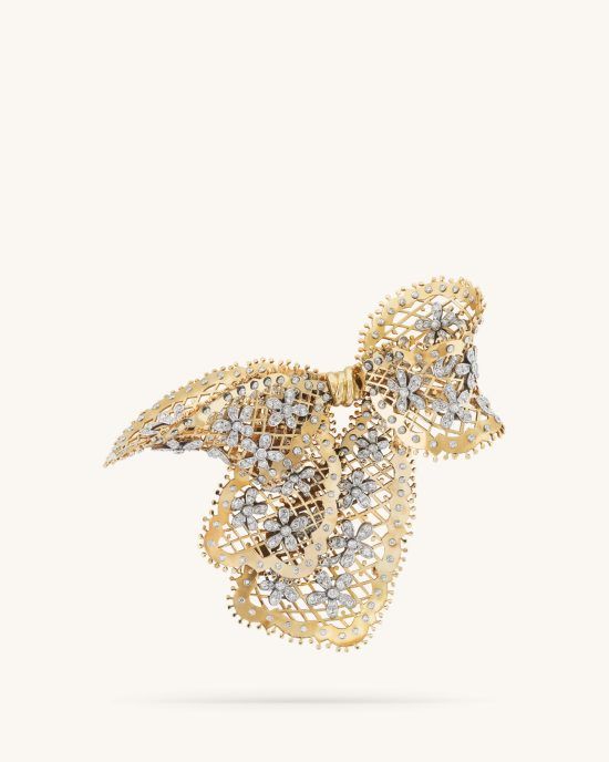 Dentelle clip, yellow gold, platinum, round diamonds, 1940. Heritage collection, Van Cleef & Arpels